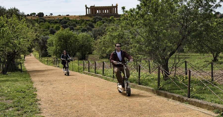 Agrigento: Valley of the Temples E-Scooter Tour - Audio guide plus real-world help from guides like Claudio and Fabrizio