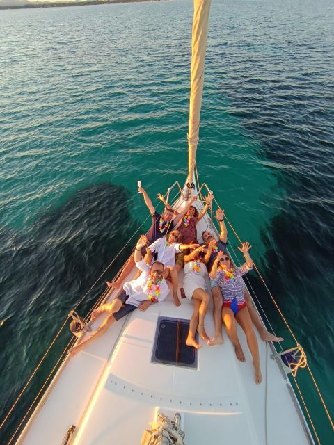 Alghero: Sunset Sailing Aperitif Experience - Maddalenetta Stop: Sunset Swim and Snorkel Gear Included