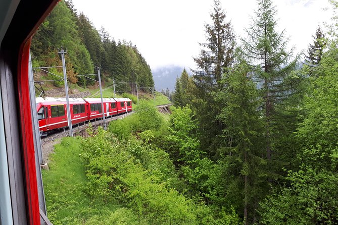 Bernina Red Train, Swiss Alps & St Moritz From Milan - Tirano in the evening: what happens after the Alps