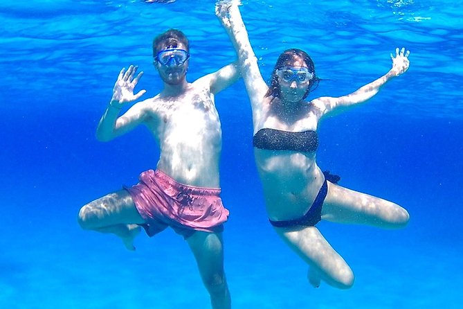 Boat Tour Egadi Day discover Favignana and Levanzo from Trapani - Drinks, snacks, and onboard comfort that actually help