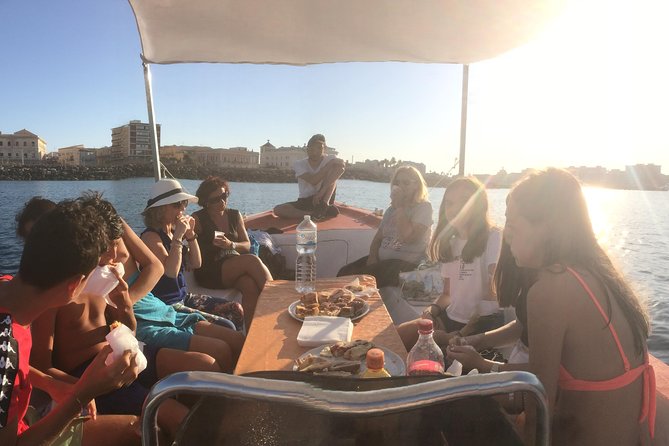 Boat tour of Ortigia Island and sea caves - Price and Value: 24.20 for Caves, Circumnavigation, and a Boat-View Lesson