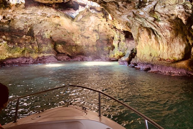 Boat tour of the Polignano a Mare caves with aperitif - Lama Monachile and the Domenico Modugno Cliffs Above the Sea