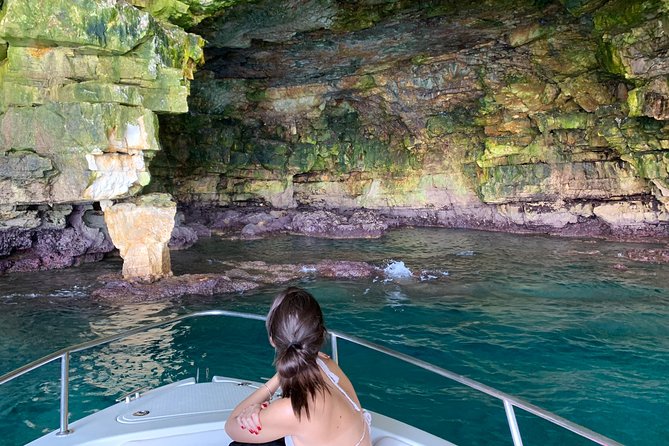 Boat tour of the Polignano a Mare caves with aperitif - Grotta Palazzese and Scoglio dellEremita, Two Very Different Kinds of Famous