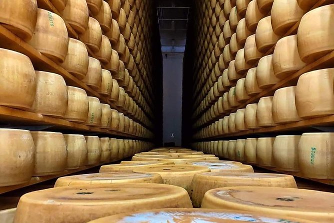 Bologna Food Experience: Factory tours & Family-Style Lunch - Stop 2 in Monteveglio: prosciutto factory rules, long curing, and Lambrusco