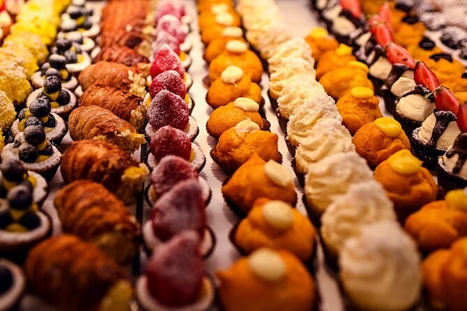 Bologna Food & Market Tour with 6 Tastings, Pasta, Wines & More - Prosciutto di Parma, mortadella, wines, and the secret dish stop