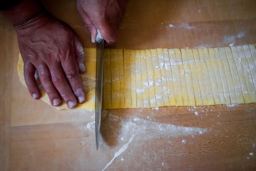 Bologna: Pasta Tagliatelle al Ragu Cooking Class with Wine - Buzz Mattioli Meeting Point, Plus the Real-World Location Tip
