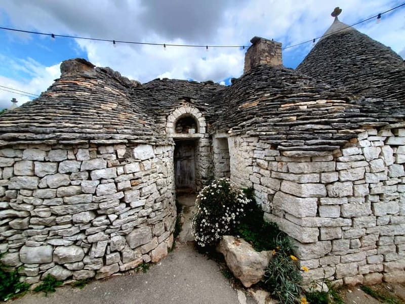 Brindisi: Alberobello, Locorotondo & Ostuni Tour with Brunch - Alberobello trulli: from photo stops to walking inside the cone-roof houses