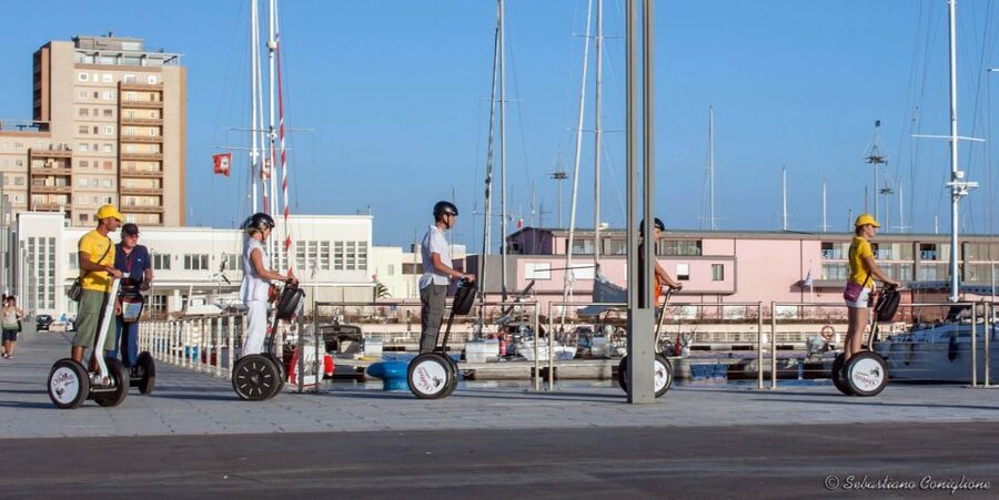 Cagliari: Guided Segway Tour - Getting started at Via SantEulalia: training, helmets, and earphones