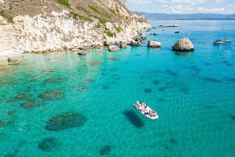 Cagliari: Zodiac Boat Tour, 3-4 SwimStops, Wine & Snorkeling - Cala Fighera and the Photo Stop Moment That Breaks It Up