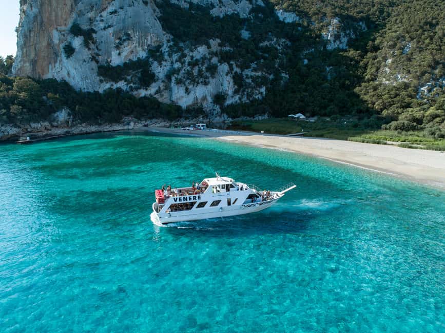 Cala Gonone: Grotta Bue Marino & Cala Luna Beach Boat Tour - Cala Luna beach time: the white crescent with seven layers of detail
