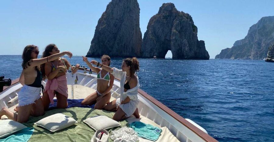 Capri: Island and Grottos Boat Cruise with Snacks and Drinks - Marvellous Grotto, White Grotto, and the Arch of Love from close range