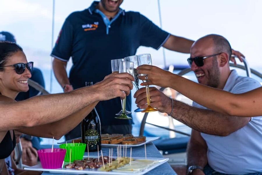 Catania: Cyclops Coast Cruise with Appetizer & Snorkeling - Cycling back to port: the last swim and the Aci Trezza-island perspective