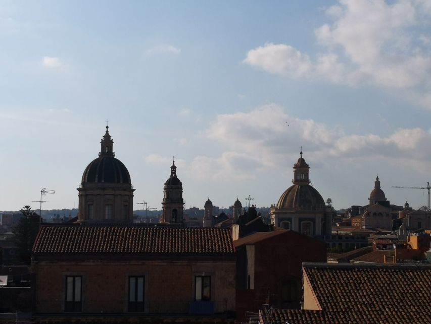 Catania: Heart of the City Guided Walking Tour - The Catania Fish Market Stop That Turns Into Food Tips