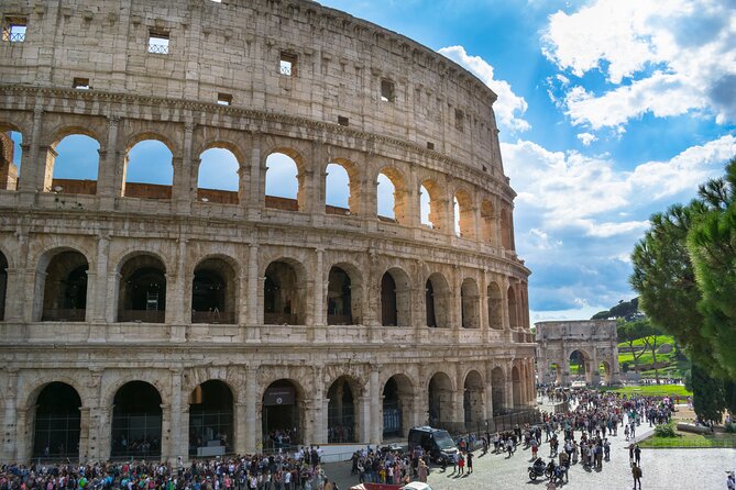 Colosseum Express Guided Tour and Ancient Rome Admission Included - Entering the Colosseum: Arena Views and Roman Engineering Stories