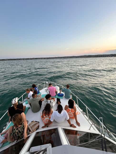 Desenzano del Garda: Sunset Boat Trip at Sunset with Drink - The Prosecco toast and the onboard mood