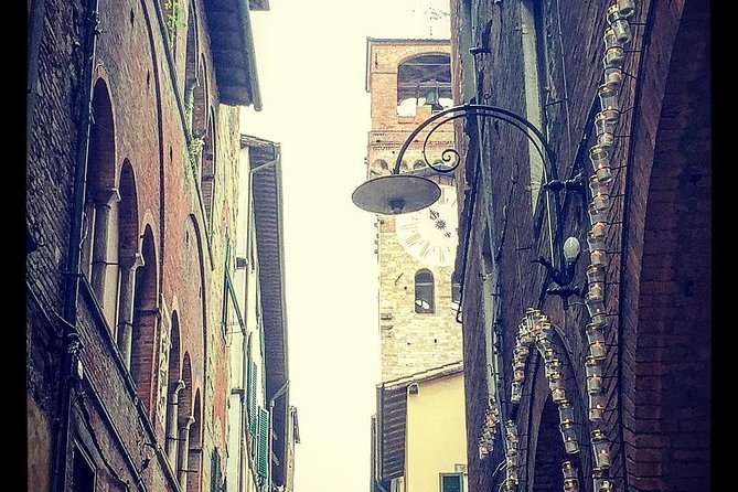 Discover Lucca’s Secrets on a Guided Walking Tour - Stop 5: Cathedral of San Martino, the Pisa-Lucca Romanesque facade and optional inside highlights