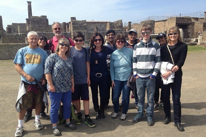 Explore Pompeii Half Day Highlights Tour with Pickup from Naples - Via degli Augustali leads you to the Lupanare
