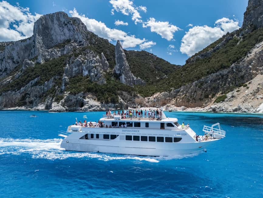 From La Caletta or Orosei: Gulf of Orosei Cruise - Imperatrice on the water: Sun deck, shade, and space that actually helps