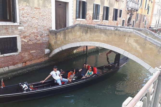 From Milan: Venice Full-Day Guided Tour With Boat Ride - Rialto and the Grand Canal views without the full detour