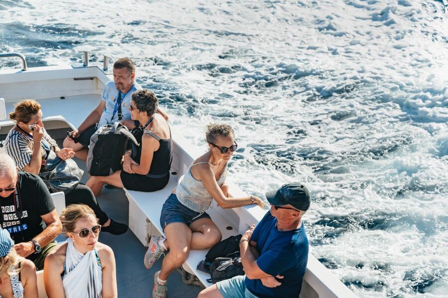 From Naples: Gulf of Naples & Capri Sightseeing Boat Tour - The guided boat loop from Marina Grande: caves, arches, and cliff icons