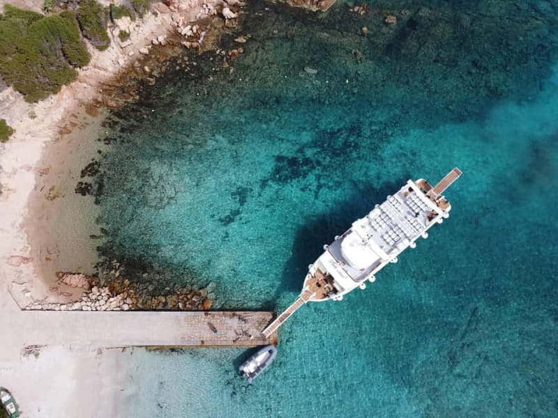 From Palau: 4 stops boat tour to La Maddalena archipelago - Price, what it includes, and where extra money can sneak in