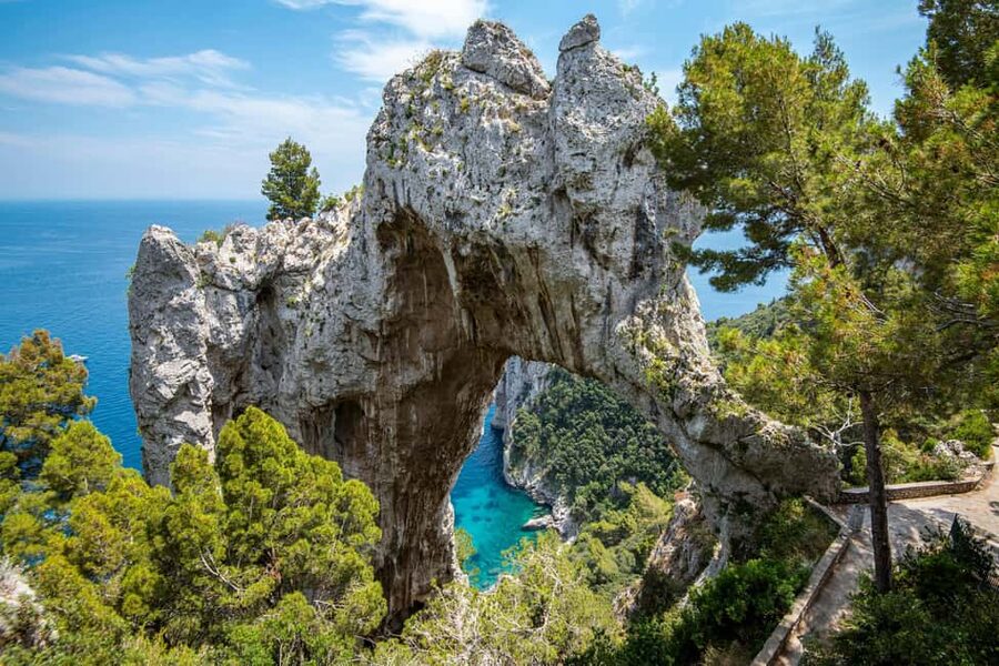 From Positano: Day trip to Capri - Group Tour by boat - The sea tour around Capri: Faraglioni, grottoes, and the optional Blue Grotto