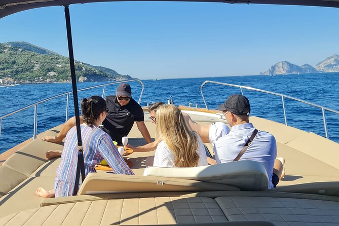 From Sorrento: Capri Small-Group Boat Tour with 4 Hours ashore - The coastal cruise to Capri: Marina Grande, Roman ruins, and Faraglioni