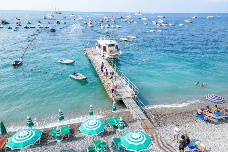 From Sorrento/Nerano: Amalfi and Positano Boat Tour - The morning cruise: 9:00 AM departure, Li Galli Sirens, and quick photo stops