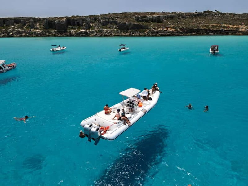 From Trapani: Egadi Islands Favignana & Levanzo Cruise - Drinks, snack, and the music factor: what’s included versus what you’ll feel
