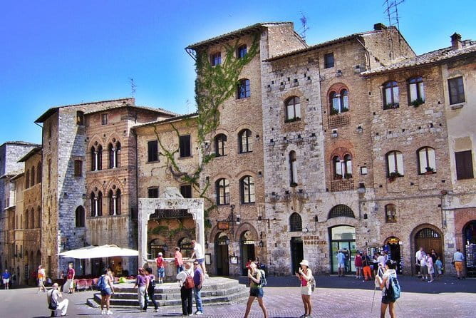 Full Day Tour to Val d'Orcia and Gladiator's Fields with Wines - Stop 5: Montepulciano, Vino Nobile, and where the hilltop energy hits