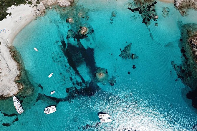 Luxury catamaran from Porto Rafael-Palau to the Maddalena Archipelago - Maddalena Islands: Razzoli and Santa Maria for cliffs, lighthouse views, and a convent story