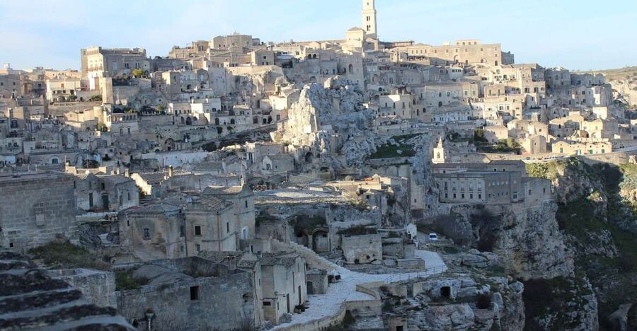 Matera: Sassi Tour with Entry to Rock Houses and Churches - Piazza Duomo to Sasso Caveoso: the outside cathedral, then the cave interior mindset