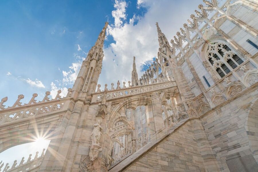 Milan: Duomo Rooftop and Cathedral Guided Tour with Tickets - Cathedral walk-through: where gothic design becomes a full-body experience