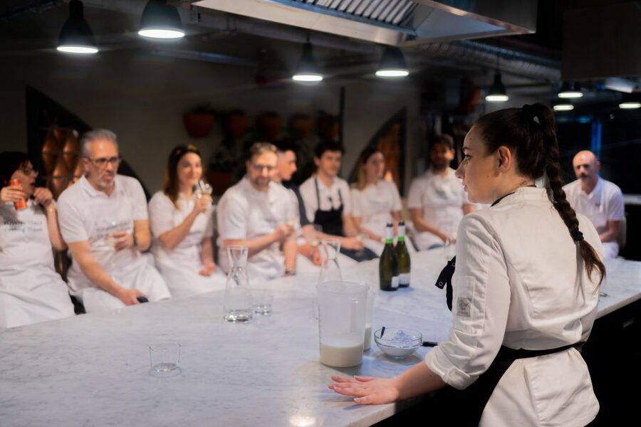 Milan: Pizza or Pasta and Gelato-Making Class with Wine - Gelato making in the middle: mixing chocolate, then churning your own