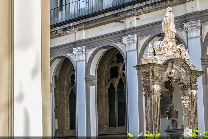 Naples Walking Tour with Underground Roman Ruins Ticket - Castello Nuovo, Teatro di San Carlo, and Galleria Umberto under the same roofline