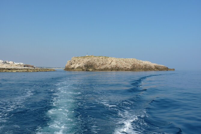 Polignano a Mare boat tour emotions, caves, diving and appetizers - Why this Polignano a Mare boat tour works better than shore viewpoints