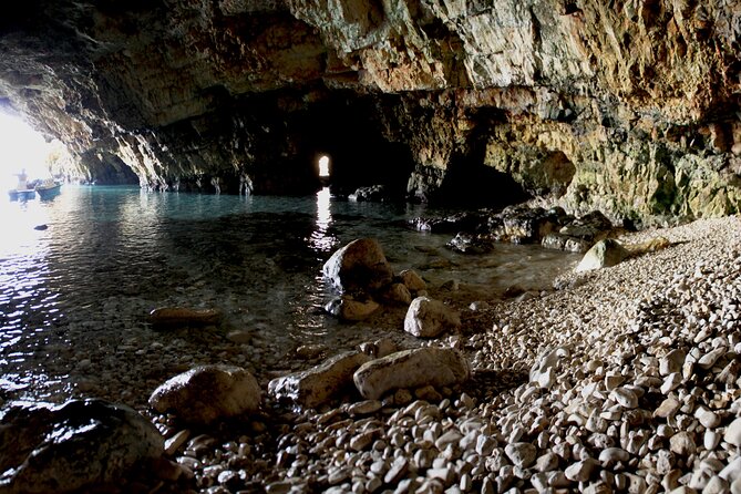 Polignano a Mare boat tour emotions, caves, diving and appetizers - Grotta Piana: emerald water and calmer feel near the rock