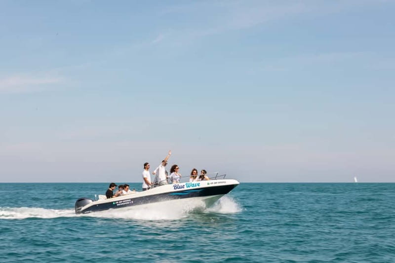 Polignano a Mare: Boat Tour with Prosecco and Snacks - Polignano a Mare caves by boat, with Prosecco as the payoff