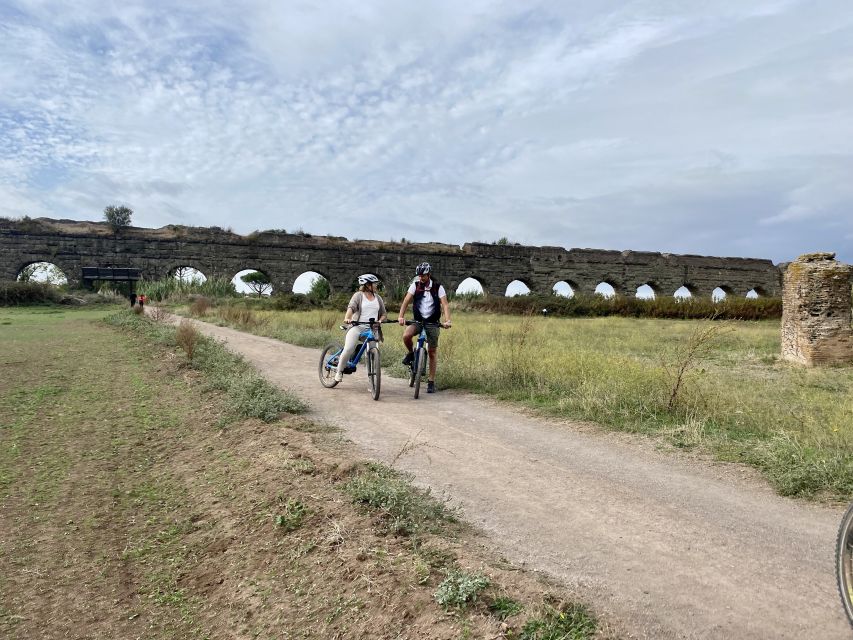 Rome:Appian Way E-bike Tour with Catacombs, Aqueducts & Food - Cycling the ancient road: ruins like Maxentius and Cecilia Metella along the route