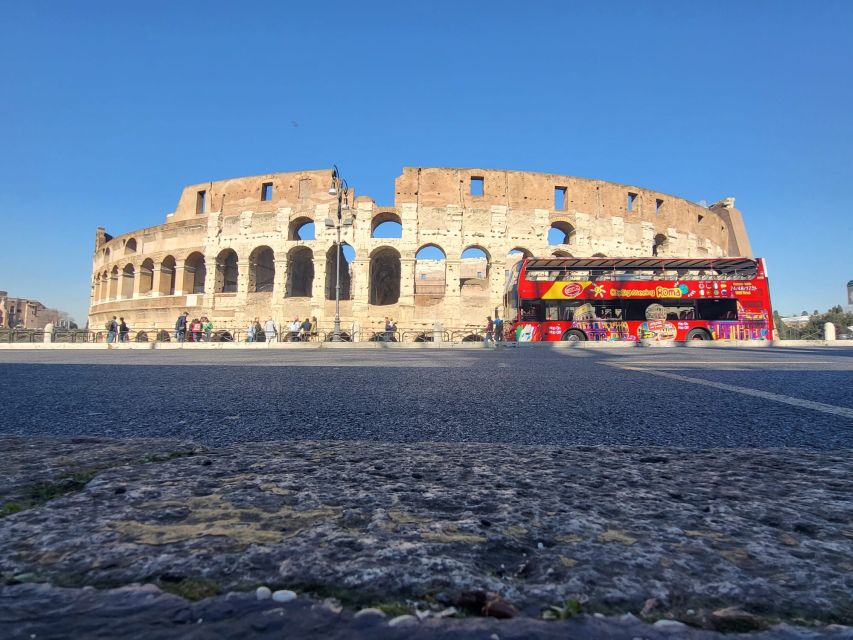 Rome: City Highlights Open-Top Bus Night Tour - Audio guide through headphones: 8 languages, clear pacing, occasional glitches