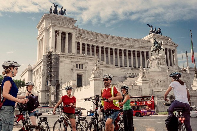 Rome City Small Group Bike Tour with quality Cannondale EBike - Stop-by-stop: Piazza del Colosseo and the Colosseum viewpoint run