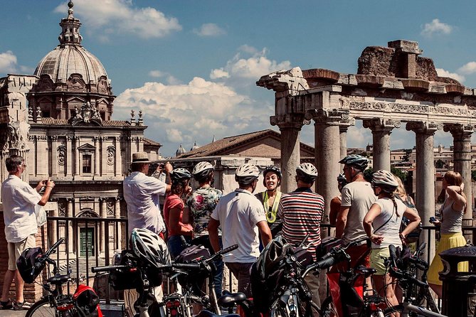Rome City Small Group Bike Tour with quality Cannondale EBike - Piazza Venezia: Trajan’s Column, the Vittoriano, and a layered skyline