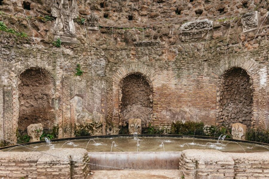 Rome: Colosseum, Palatine Hill & Roman Forum Guided Tour - Roman Forum Walk: Arch of Titus, Vestal Virgins, and Julius Caesar’s Burial Site