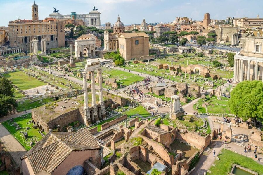 Rome: Colosseum, Roman Forum and Palatine Hill Group Tour - Roman Forum stops: arches, temples, and power you can read in stone