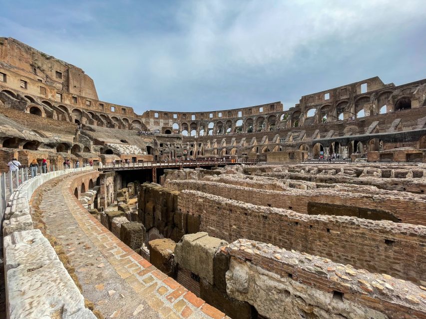 Rome: Colosseum Tour with Access to the Gladiator Arena - Entering through the gladiator gate, then stepping into the arena