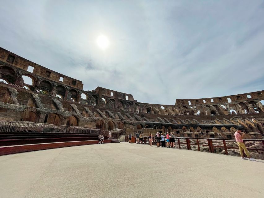 Rome: Colosseum Tour with Access to the Gladiator Arena - The podium moment and the thrill of the main entrance perspective