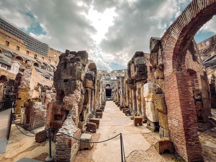 Rome: Colosseum Underground and Arena Tour - Hypogeum under the Colosseum: corridors, travertine, drainage, and trapdoors