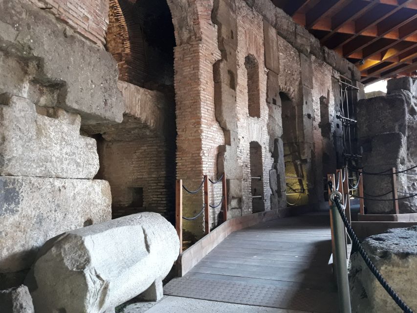 Rome: Colosseum Underground Small Group Guided Tour - Roman Forum self-guided access: politics, trials, and gladiatorial drama