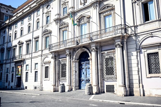 Rome Food Tour in the Historic Centre with 8+ Food Tastings - Four Rivers fountain and ancient walkway remains, where Rome overlaps itself