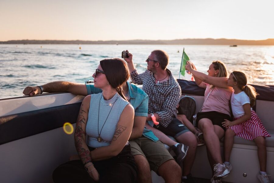 Sirmione: Sunset Boat Cruise with Local Wine - Scaligero Castle from the lake, including two bridge passes